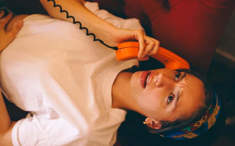 a woman who is upset talks on the phone