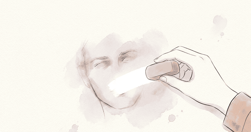 A woman's hand calmly holding a soft eraser, gently smudging away a faint pencil-sketch outline of a man's face on paper. The sketch is already mostly gone, just traces remaining.